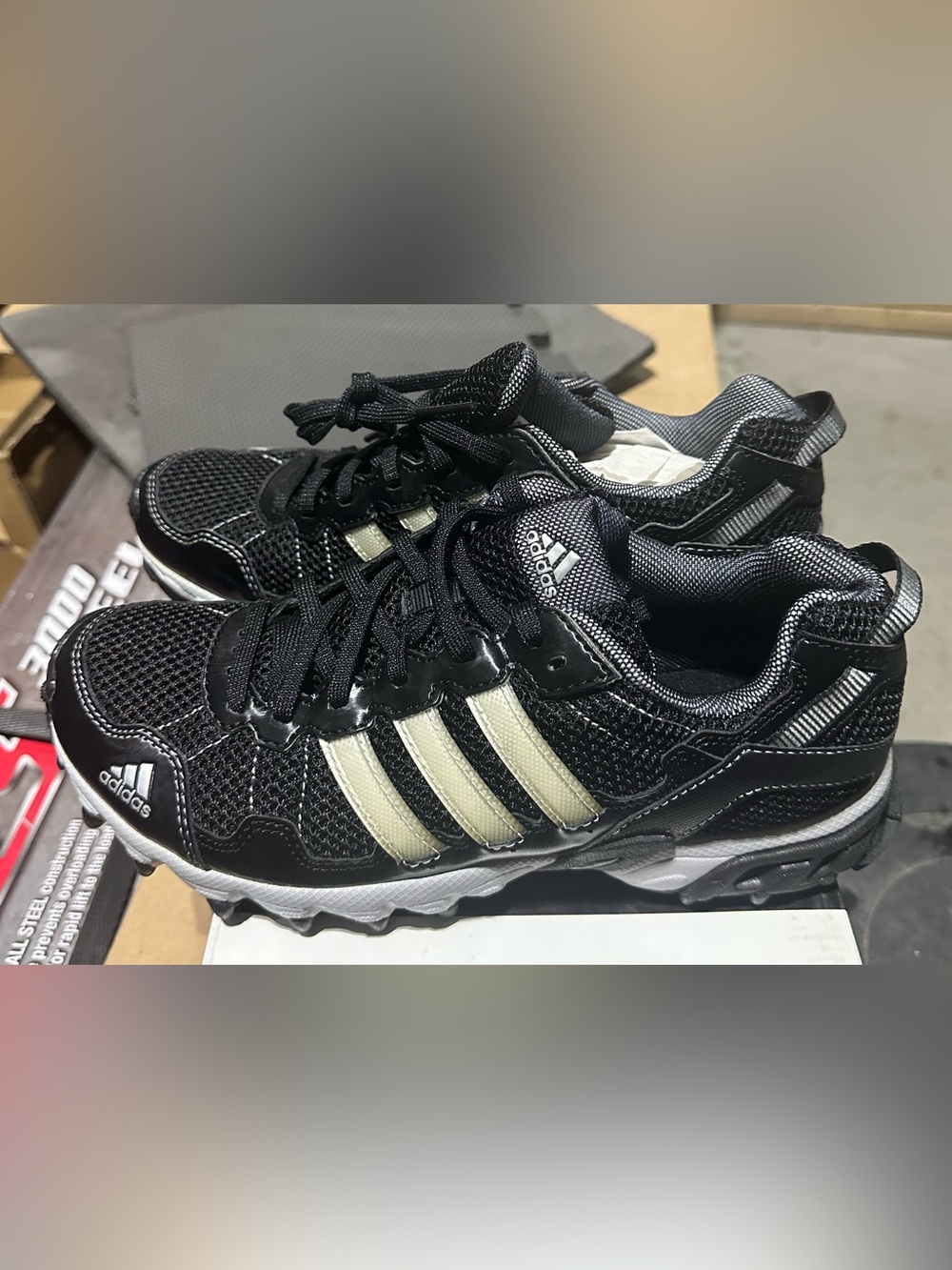 Adidas Women’s Black Athletic Sneakers with Cream Stripes